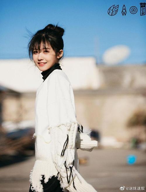 赖美云最新写真图,扎着可爱的丸子头,看到她的笑容让人心情大好
