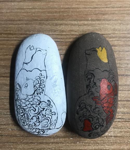 石头画两只纹身猫