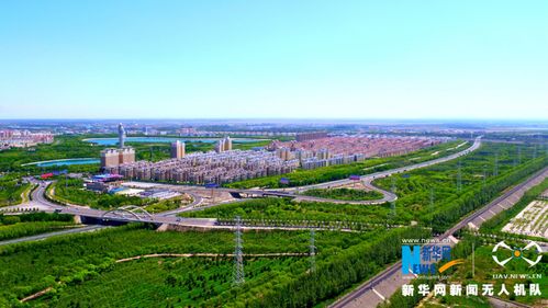 甘肃新闻 图片新闻          进入盛夏,嘉峪关市区郁郁葱葱,绿树成荫