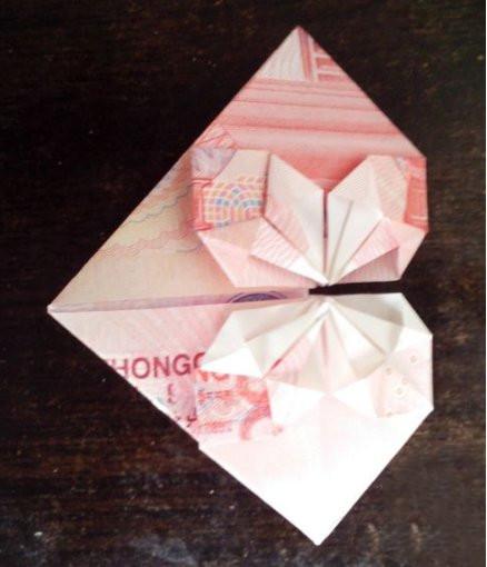 com--图表展板】     用一百元毛爷爷折爱心,我想这应该是很多