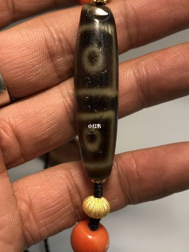 西藏千年至纯四眼天珠_天珠_拉萨八廓街自由行热门攻略_兴趣爱好_兴趣