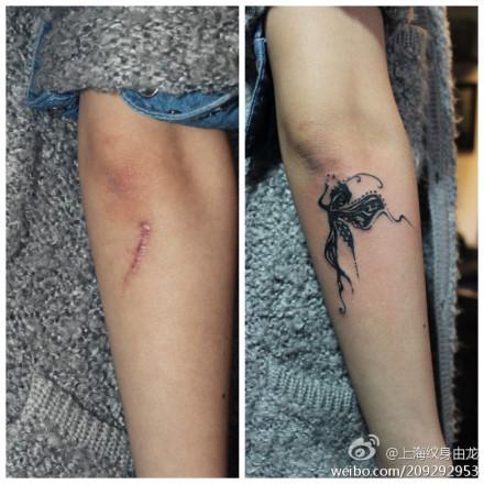 女生手臂遮疤纹身