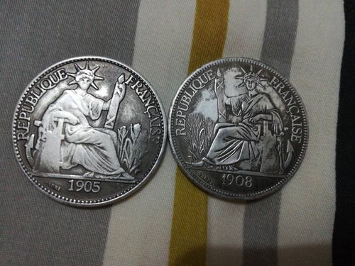 我有两枚坐洋银币,其中有一枚稀有的1905能估多少钱?谢谢!