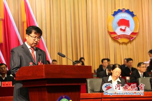 河曲县政协主席丁二明代表政协第九届河曲县委员会常务委员会作工作