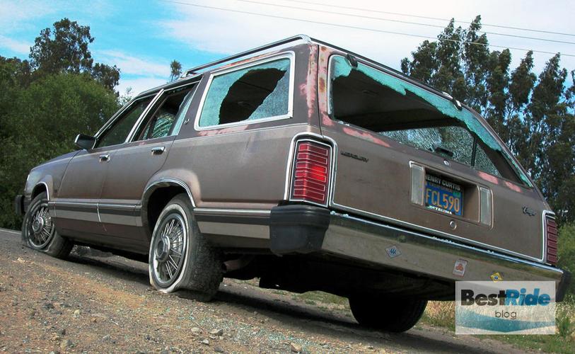 streetside: a vandalized 1982 mercury cougar wagon