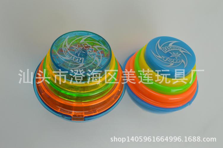 地摊货源批发 音乐陀螺 闪光透明实色陀螺玩具音乐发光 ml1600271