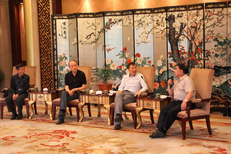 益海嘉里集团董事总经理牛余新与八大菜系领军大师亲切座谈—金龙鱼