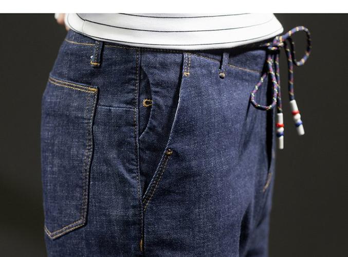 男腰头印花牛仔长裤 适用季节: 夏 腰型: 中腰 裤门襟: 拉链 款式