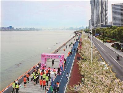 网易首页>网易号>正文申请入驻> 春暖花开时节,滨江区闻涛路"最美跑道