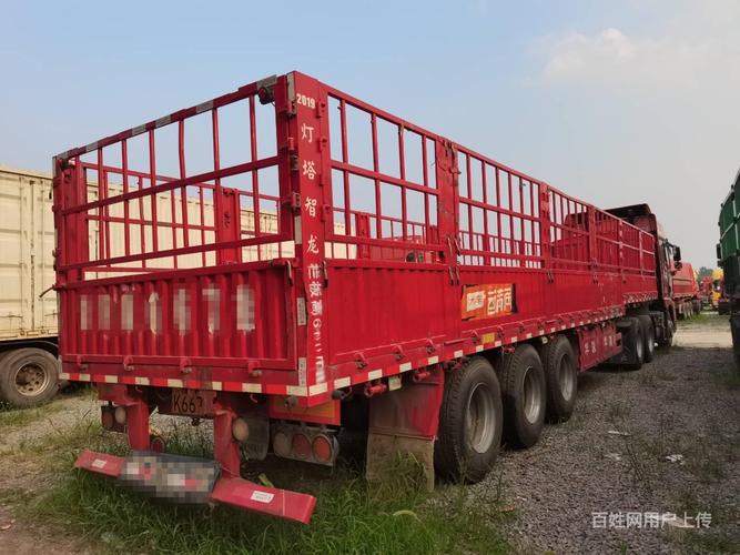 550马力解放牵引车带13米高低板花篮半挂车