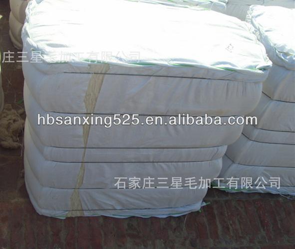 england scoured 30-34mic 60-100mm carpet grade wool