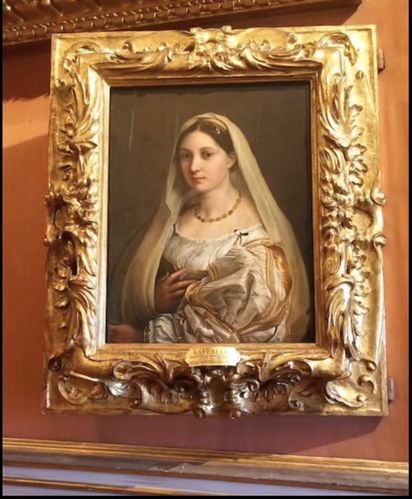 拉菲尔《带面纱的女子》