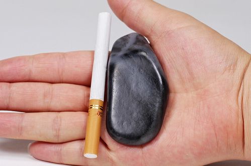 新疆和田玉青花墨玉籽料原石把件 61.82克