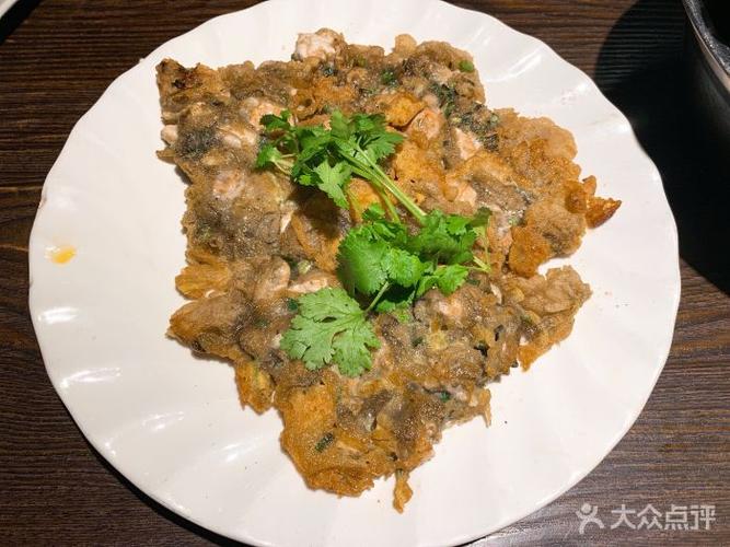 新大洋家潮汕特色菜·花胶砂锅粥蚝仔烙图片