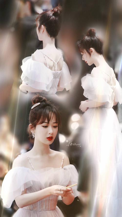 一身纱裙仙气飘飘,搭配丸子头俏皮可爱,妥妥的小公主,神仙颜值呀!