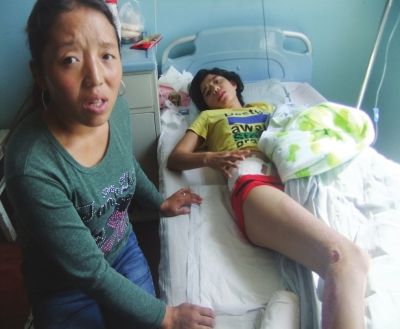 受伤孕妇躺在医院肇事工人不见踪影(图)何女士还在住院治疗兰州晚报讯