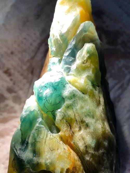 大马坎赌石剥出极品三彩翡翠定制佛系步步生莲完美