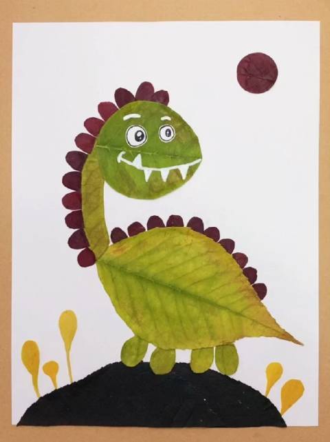 带孩子做一只可爱的小恐龙树叶画%幼儿园手工%亲子手工%树叶贴画%创意