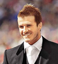 刘德华"学"贝克汉姆的发型 力捧英格兰队(多图)