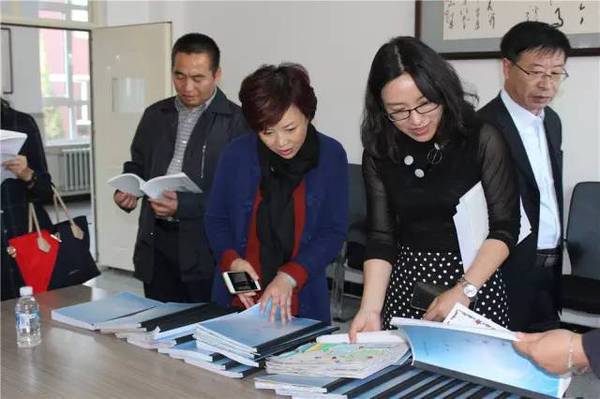 包头市青山区哈达道小学邀请成都草堂小学蓝继红校长参观座谈