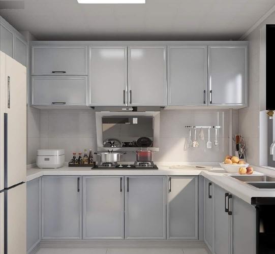 浅灰色的柜门,白色的墙面与橱柜台面,干净,整洁对于厨房这个场所再好