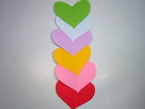 一刀剪出一个美丽的心形,简单的爱心剪纸教程