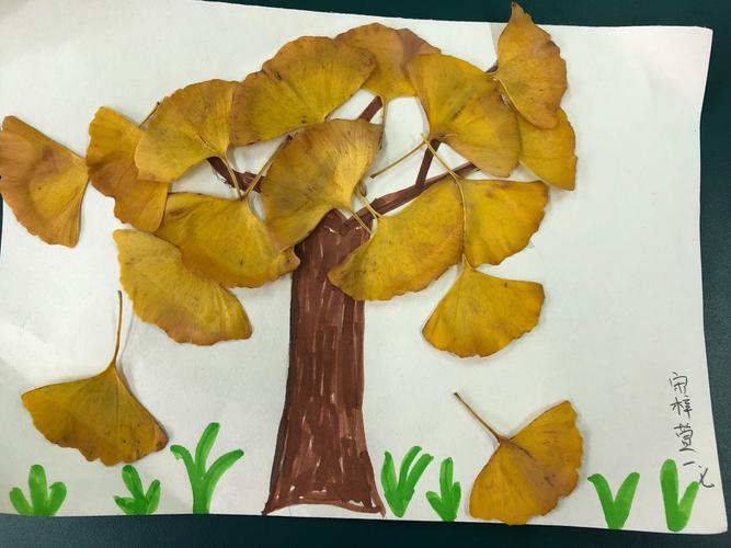 青小向日葵之家的树叶粘贴画作品展示