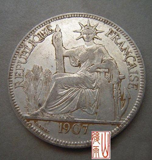 我有一个写着1907年的钱币,图案是个坐着的自由女神像