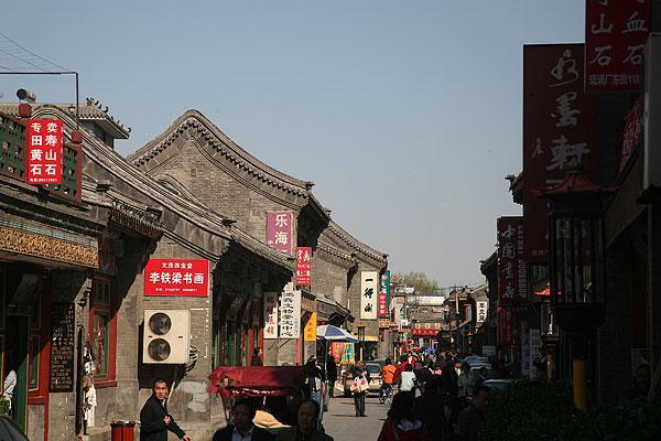 北京胡同的条件远胜于从前,人口密度太大是积重难返的主要原因